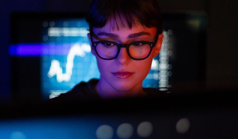 A person works on a computer.