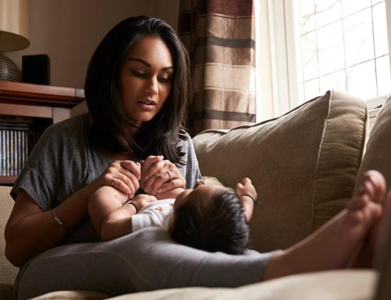 Mother with baby on her lap